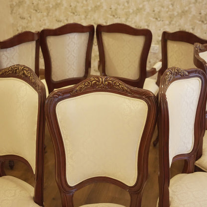 Elegant Carved Wood Dining Chair with Cream Upholstery