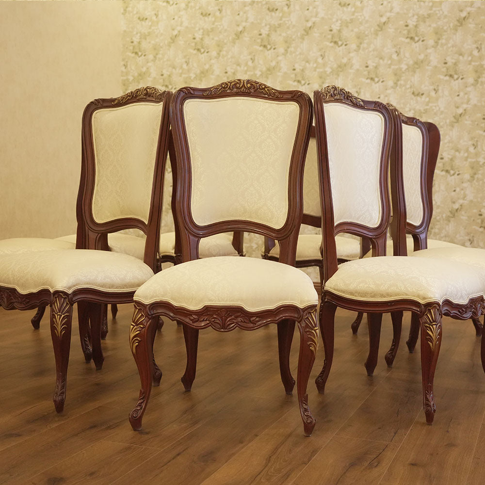 Elegant Carved Wood Dining Chair with Cream Upholstery