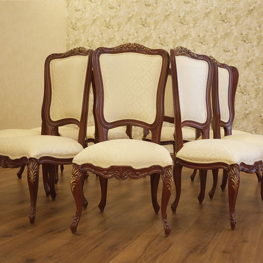 Elegant Carved Wood Dining Chair with Cream Upholstery