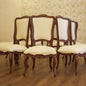 Elegant Carved Wood Dining Chair with Cream Upholstery