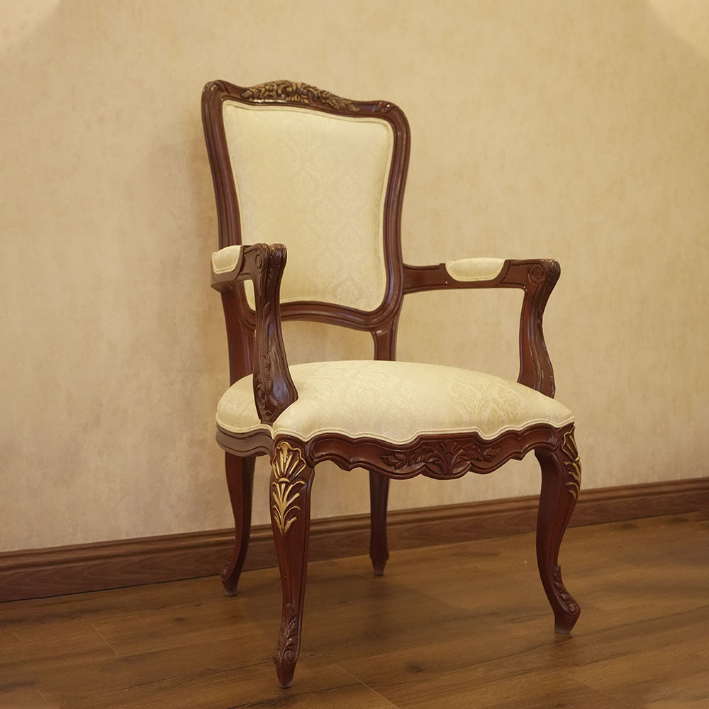 Elegant Carved Wood Dining Chair with Cream Upholstery